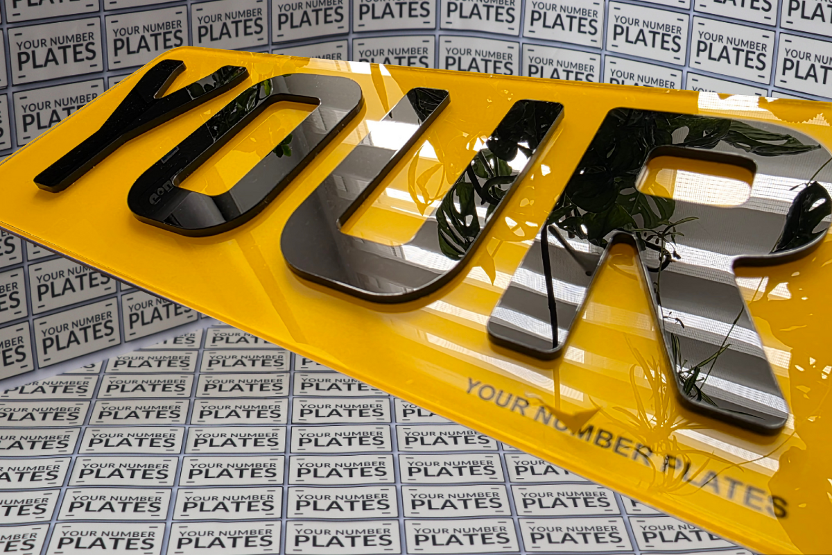 Close up of 4D acrylic number plate letters premium gloss depth finish