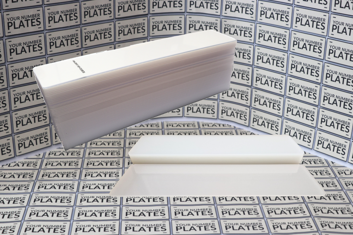 Bevelled edge blank number plate acrylic 520mm x 111mm bulk of 50