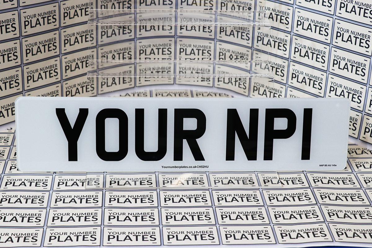 Standard front  number plate white.