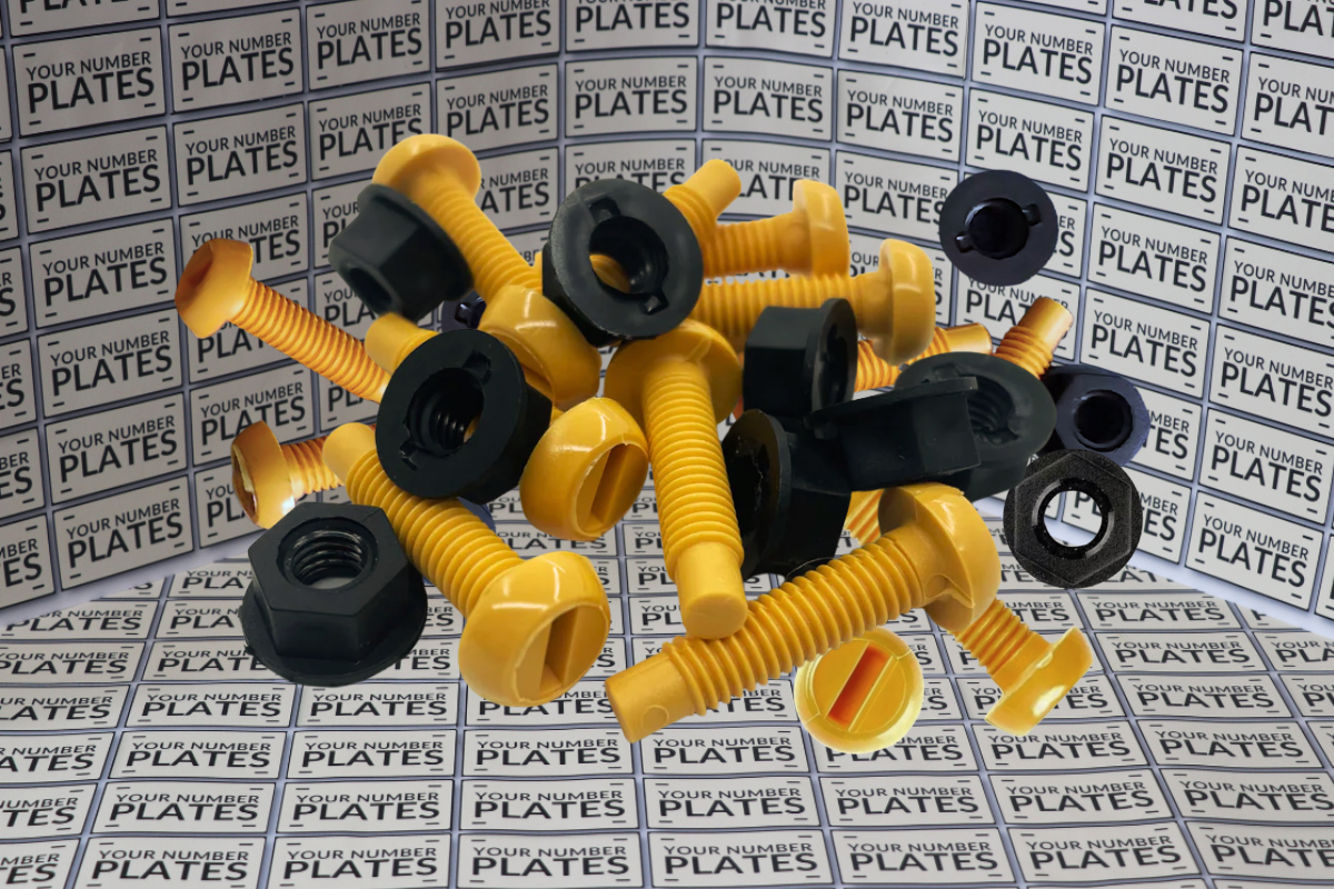 Yellow and black motorcycle screws on a background with 'Your Number Plates' text.