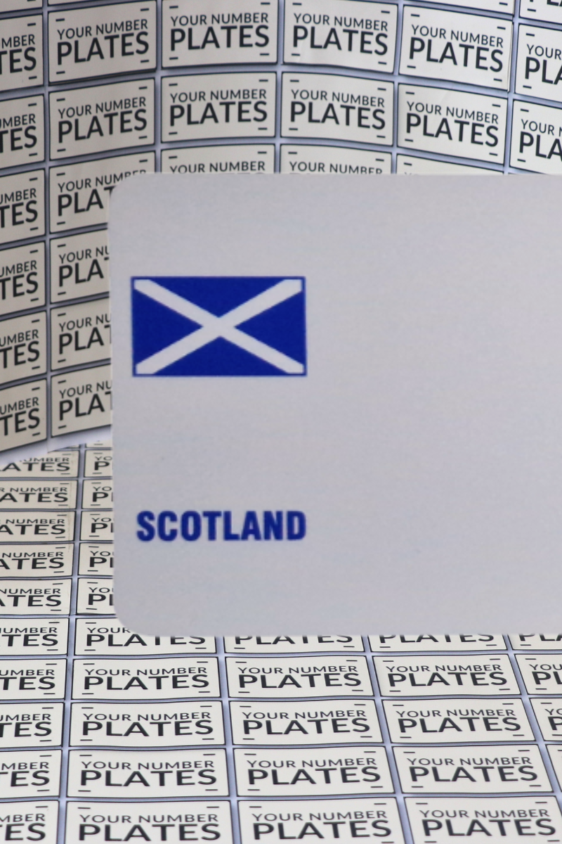 white number plate reflective with a scotland flag
