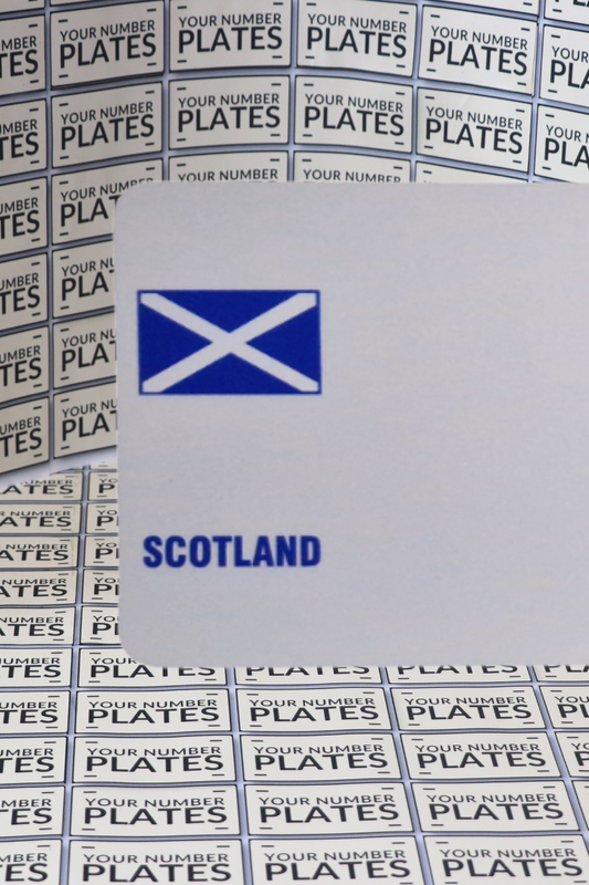 white number plate reflective with a scotland flag